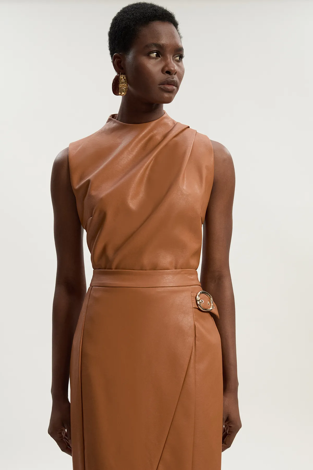 Faux Leather Drape Sleeveless Top BKK26091