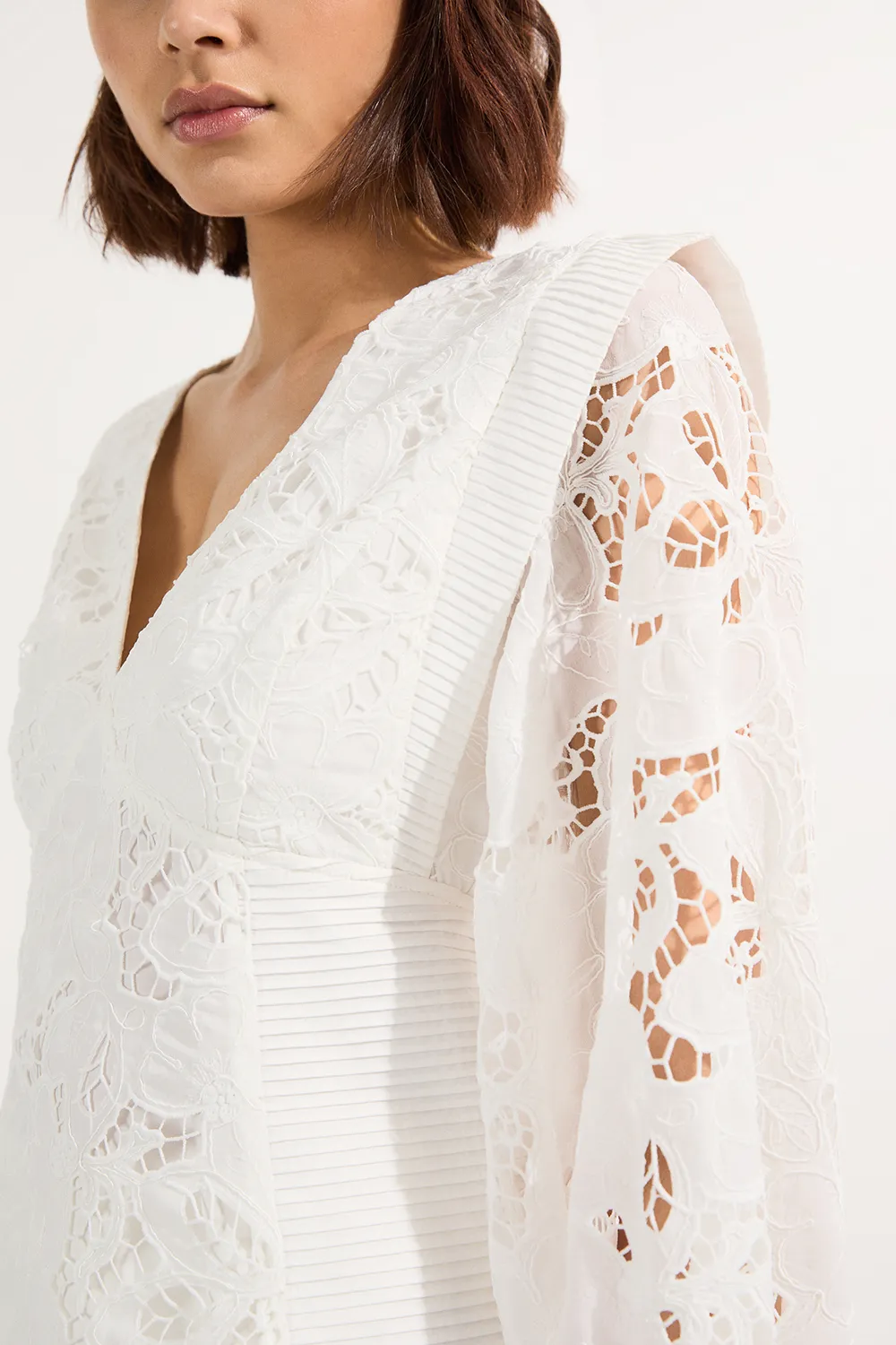 Cutwork Eyelet Drama Sleeve Woven Blouse BKK23690
