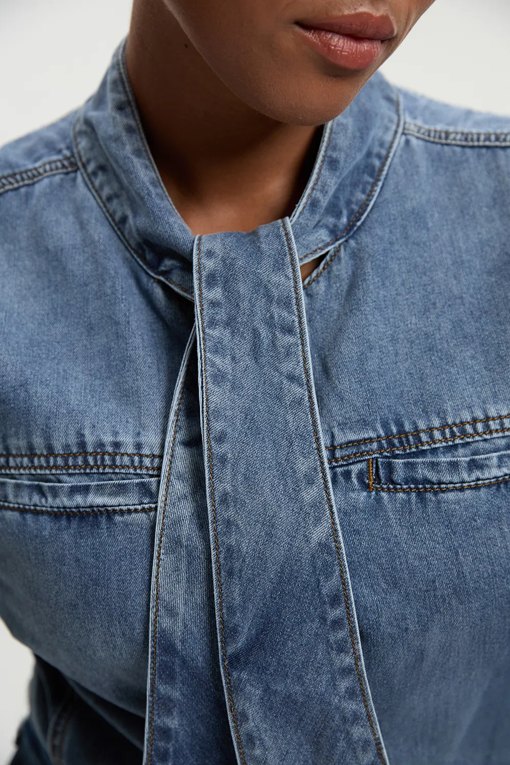 Plus Size Denim Pussy Bow Blouse BKK26235