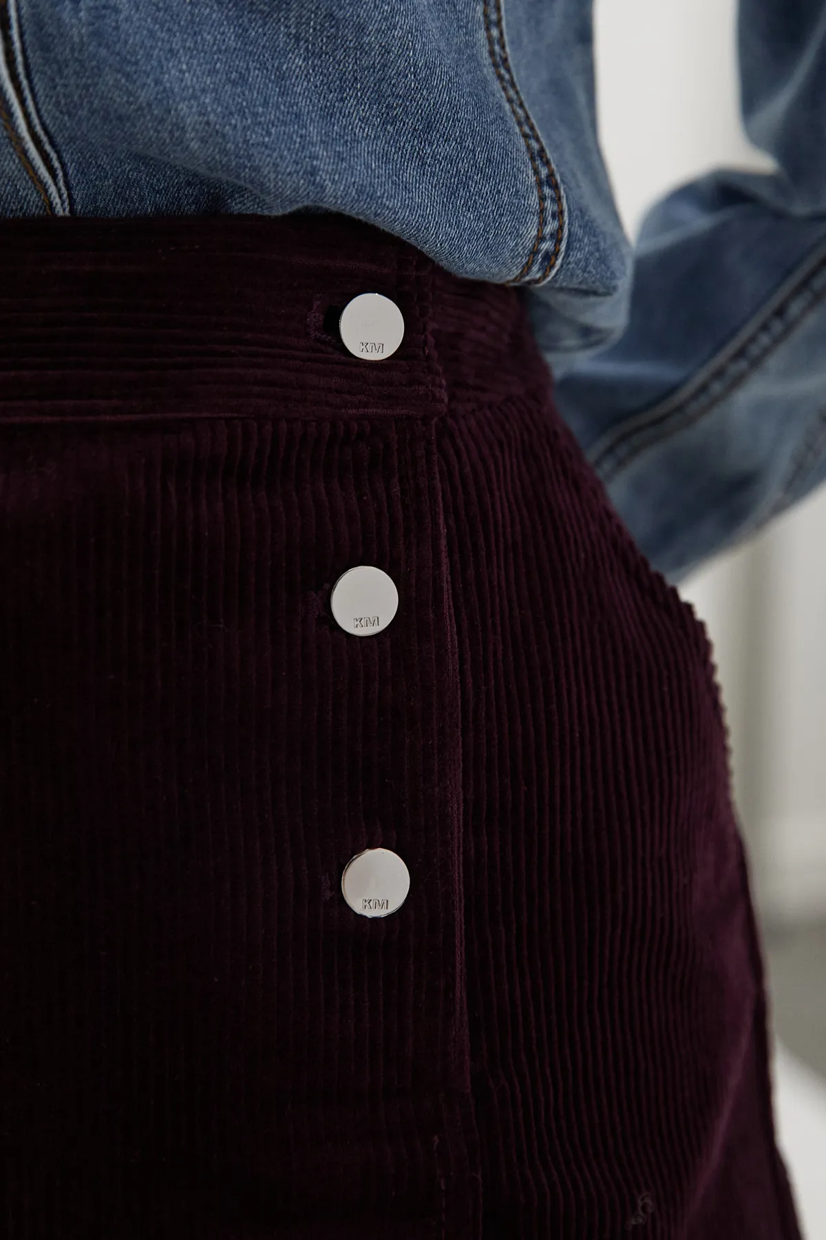 Cord Button Pleat Detail Mini Skirt BKK26693