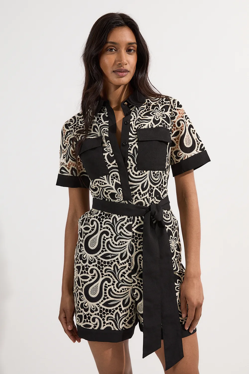 Mono Cutwork Pocket Front Woven Romper BKK24893